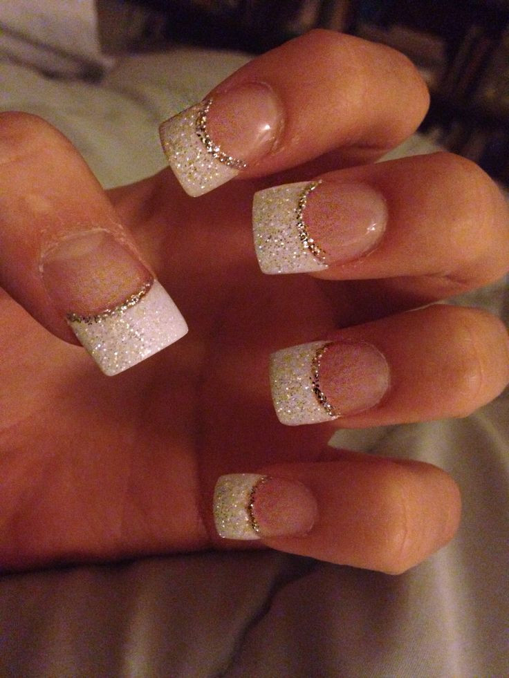 White Glitter Tip Nails
 Glitter white acrylic tips with silver accent minus the
