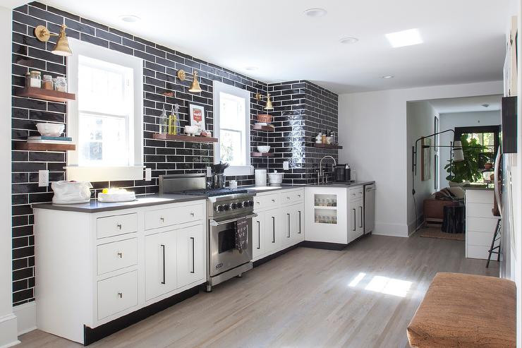 White Kitchen Black Backsplash
 White Kitchen with Gray Quartz Countertops and Glossy