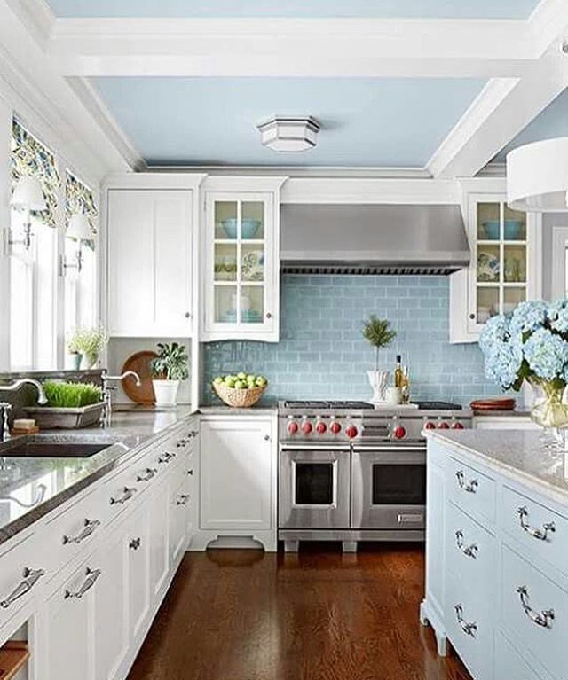 White Kitchen Blue Backsplash
 White Kitchen with Pastel Blue Cabinets and Tiles