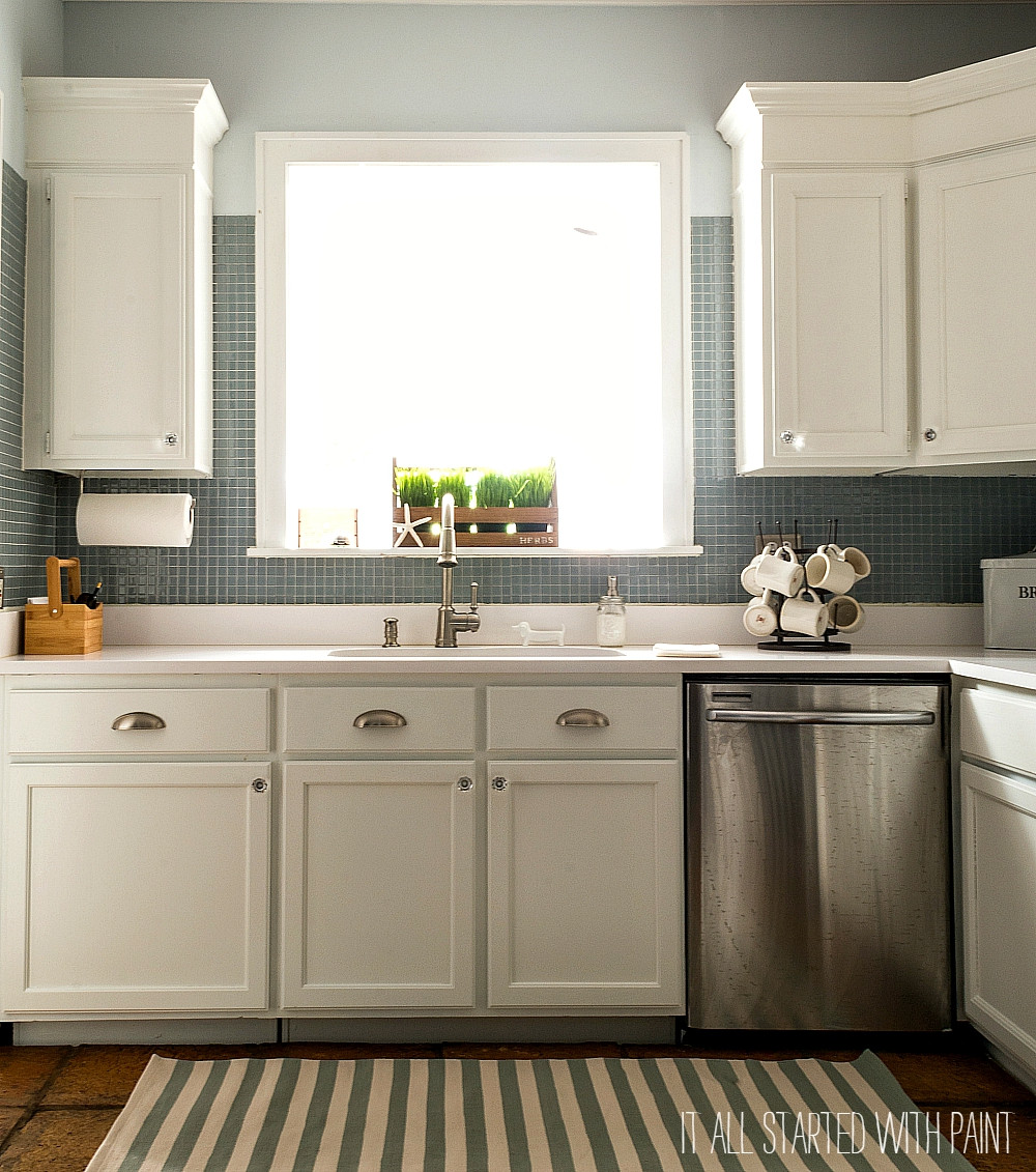 White Kitchen Blue Backsplash
 Builder Grade Kitchen Makeover with White Paint