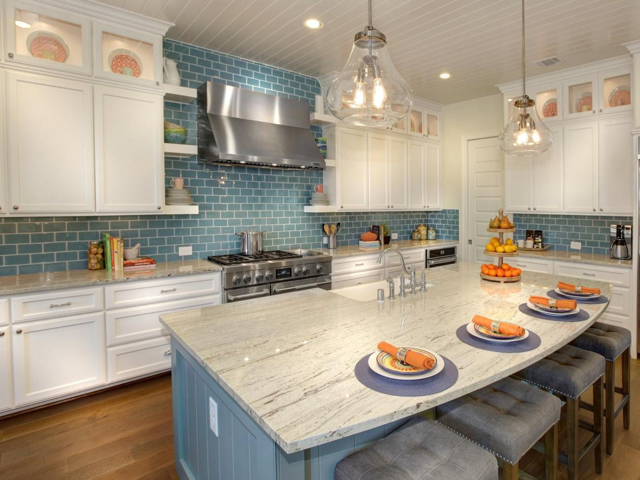 White Kitchen Blue Backsplash
 White kitchen cabinets with blue subway tile backsplash