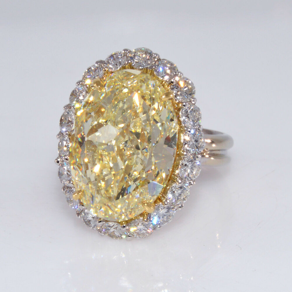 Yellow Diamond Rings
 12 71 carat GIA Canary Yellow Diamond with 2 88cts Diamond