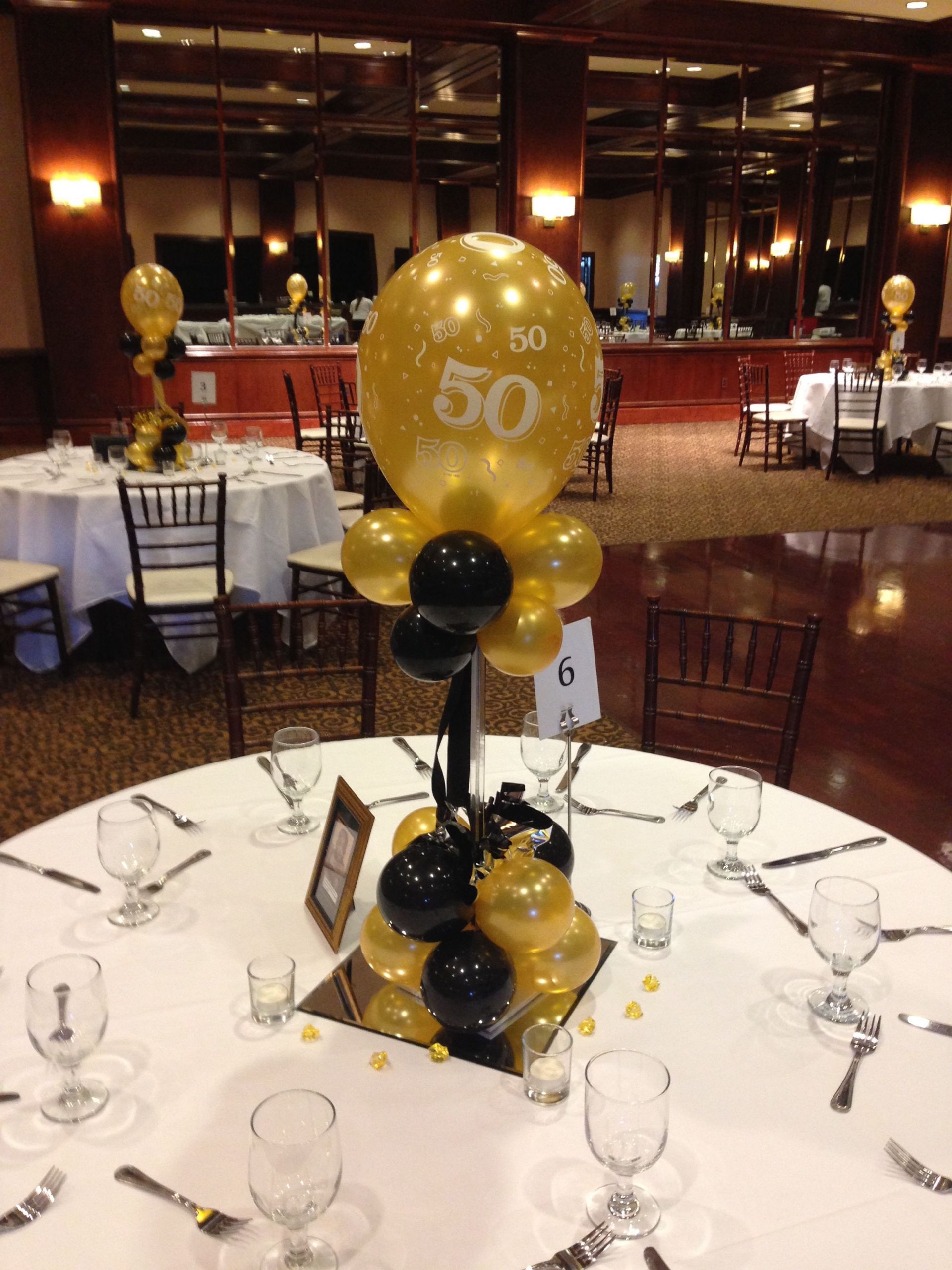 50th Birthday Decorations
 Black and gold balloon centerpieces for a 50th birthday or