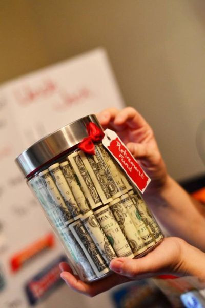 50Th Birthday Gift Ideas For Men
 Fifty one dollars bills rolled up and stacked inside a