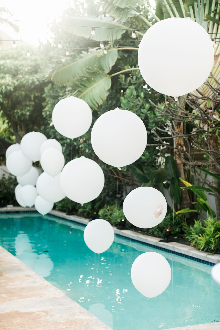All White Pool Party Ideas
 Summer celebration Image via Rebecca Arthurs