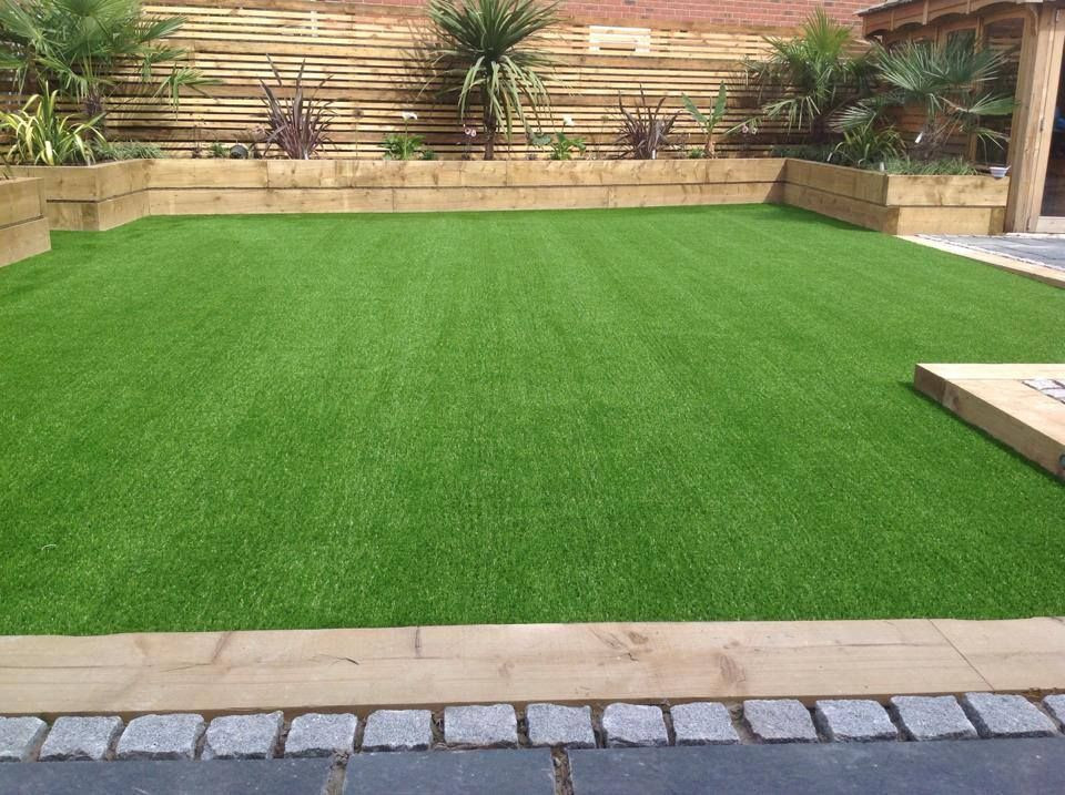 Artificial Outdoor Landscaping
 artificial grass and planters from lawn land ltd