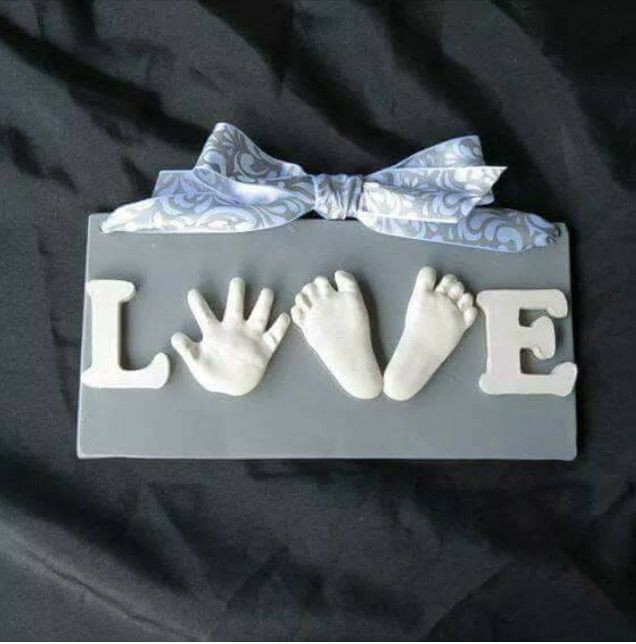 Baby Footprints DIY
 DIY hand and foot print love sign