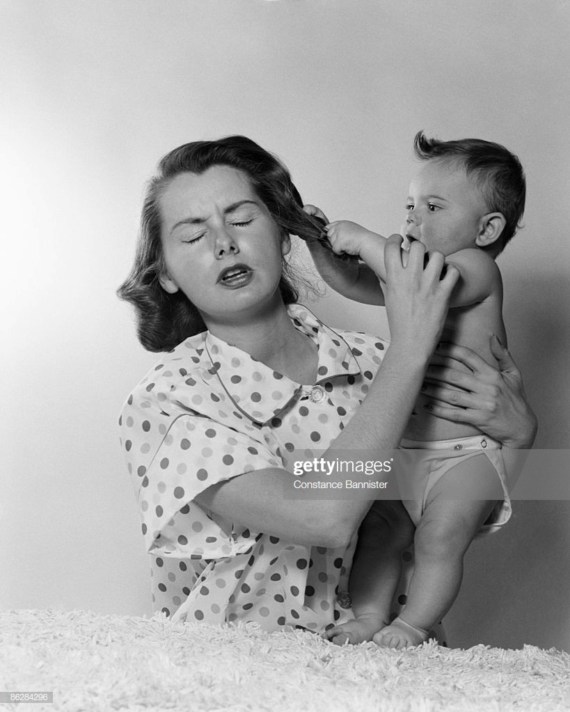 Baby Pulls His Hair
 Baby Pulling Mothers Hair Stock Getty