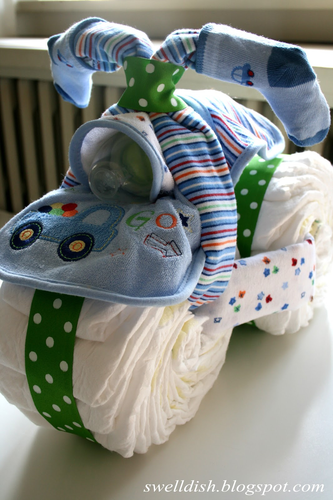 Baby Shower Diaper Crafts
 The Swell Dish The Diaper Tricycle So Long Diaper Cakes