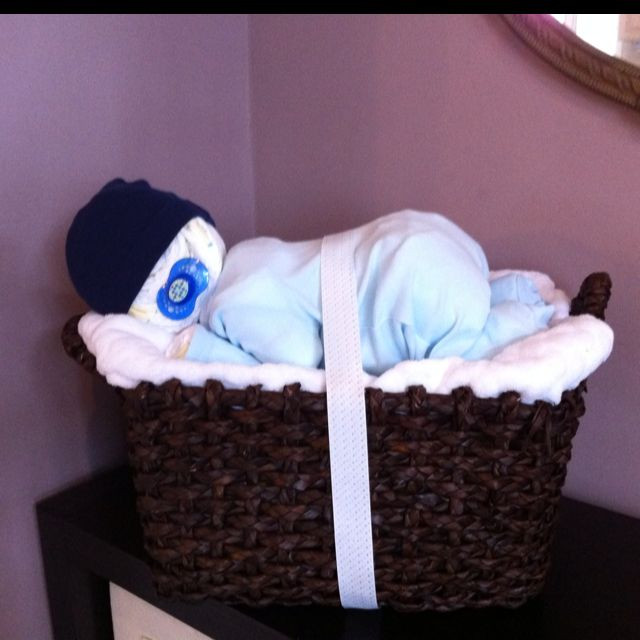 Baby Shower Gifts Made From Diapers
 Baby made out of diapers napping in a basket as an