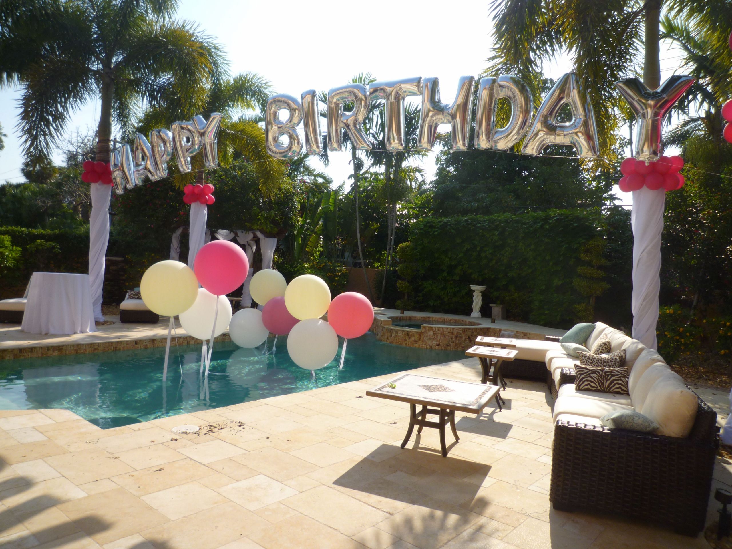 Backyard 18Th Birthday Party Ideas
 Birthday balloon arch over a swimming pool Backyard party