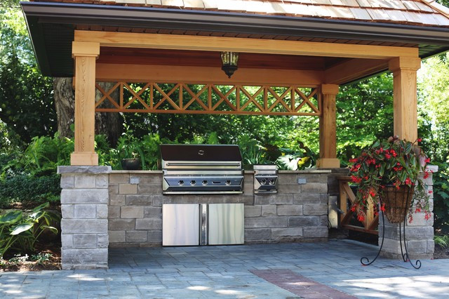 Backyard Grill Area
 Covered BBQ Area with Natural Stone Counters Traditional