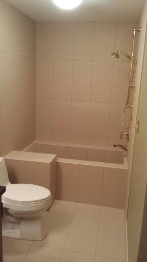 Bathroom Tile Shower
 Custom made tile soaking tub shower Roman Tub All