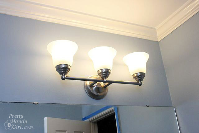 Bathroom Vanity Light With Outlet
 Changing Out a Light Fixture Bye Bye Hollywood Strip