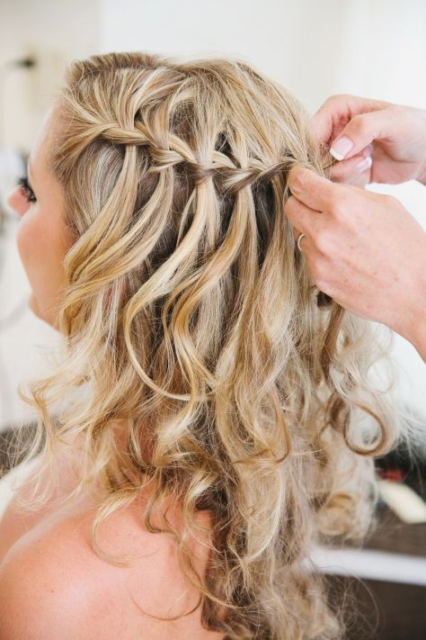 Beach Wedding Hairstyles
 Loose curls with a simple but elegant braid detail makes