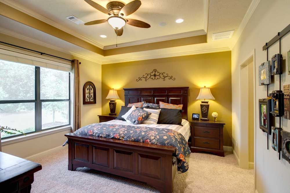 Bedroom Recessed Lighting
 The master bedroom features a tray ceiling with crown