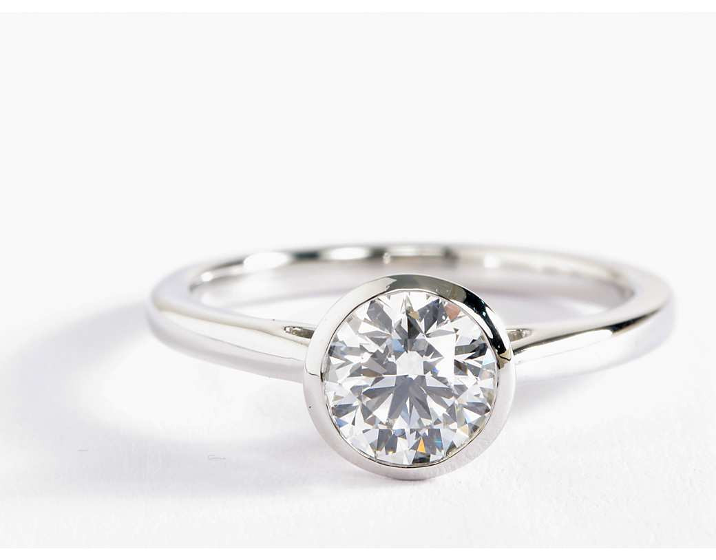 Bezel Wedding Band
 Bezel Set Solitaire Engagement Ring in Platinum