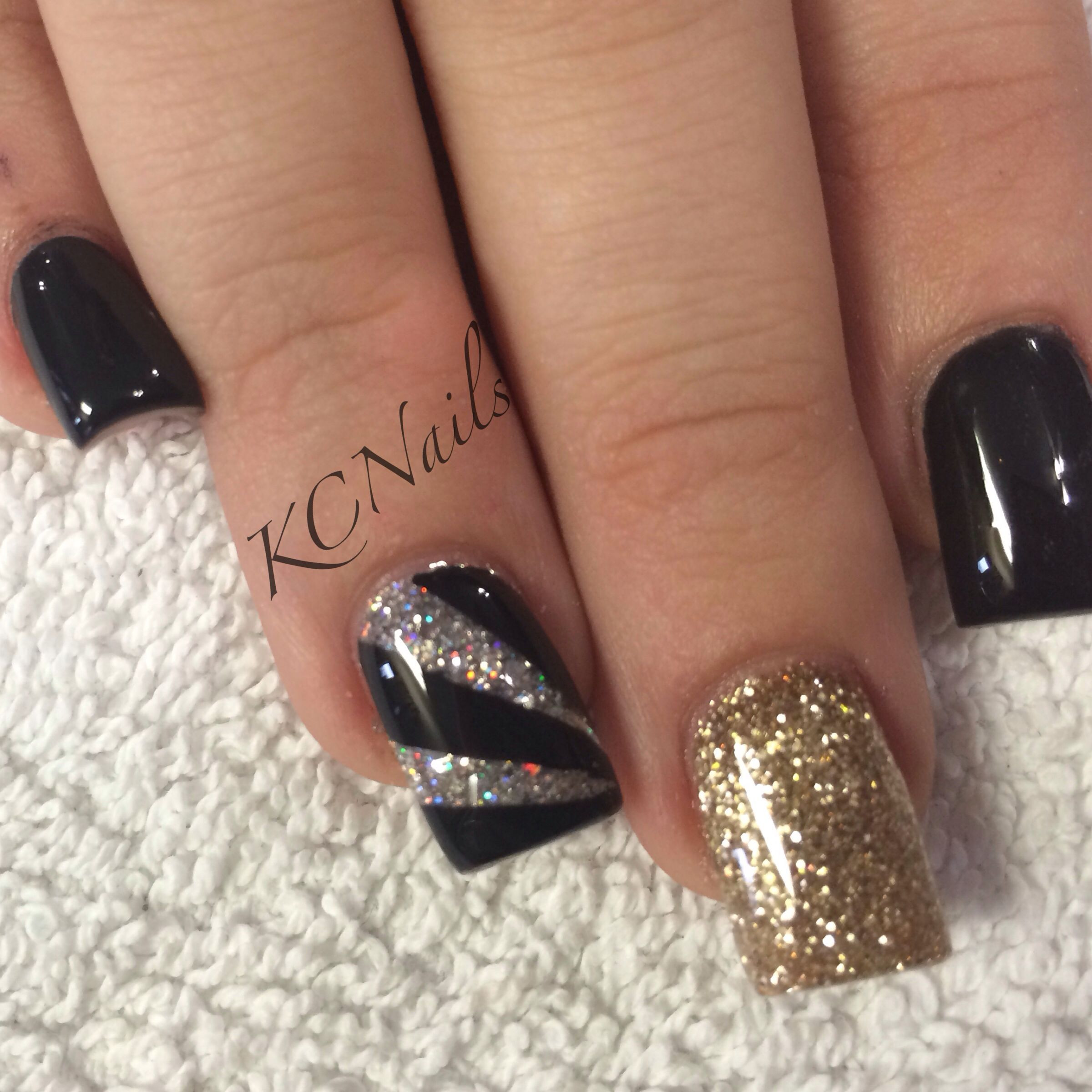 Black And Gold Nail Ideas
 Black Gold & Silver solid acrylic nails Hand painted