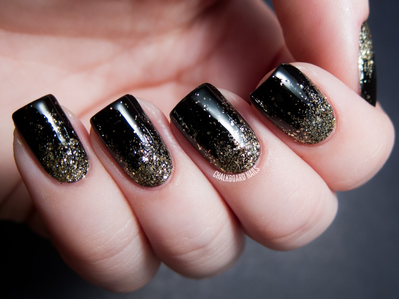 Black Glitter Nails
 Party Perfect Black and Gold Nail Art Ideas