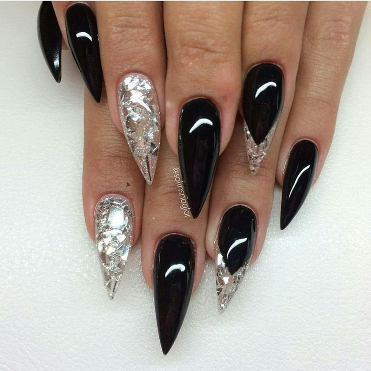 Black Glitter Stiletto Nails
 cool Black stiletto nails with glitter and silver foil