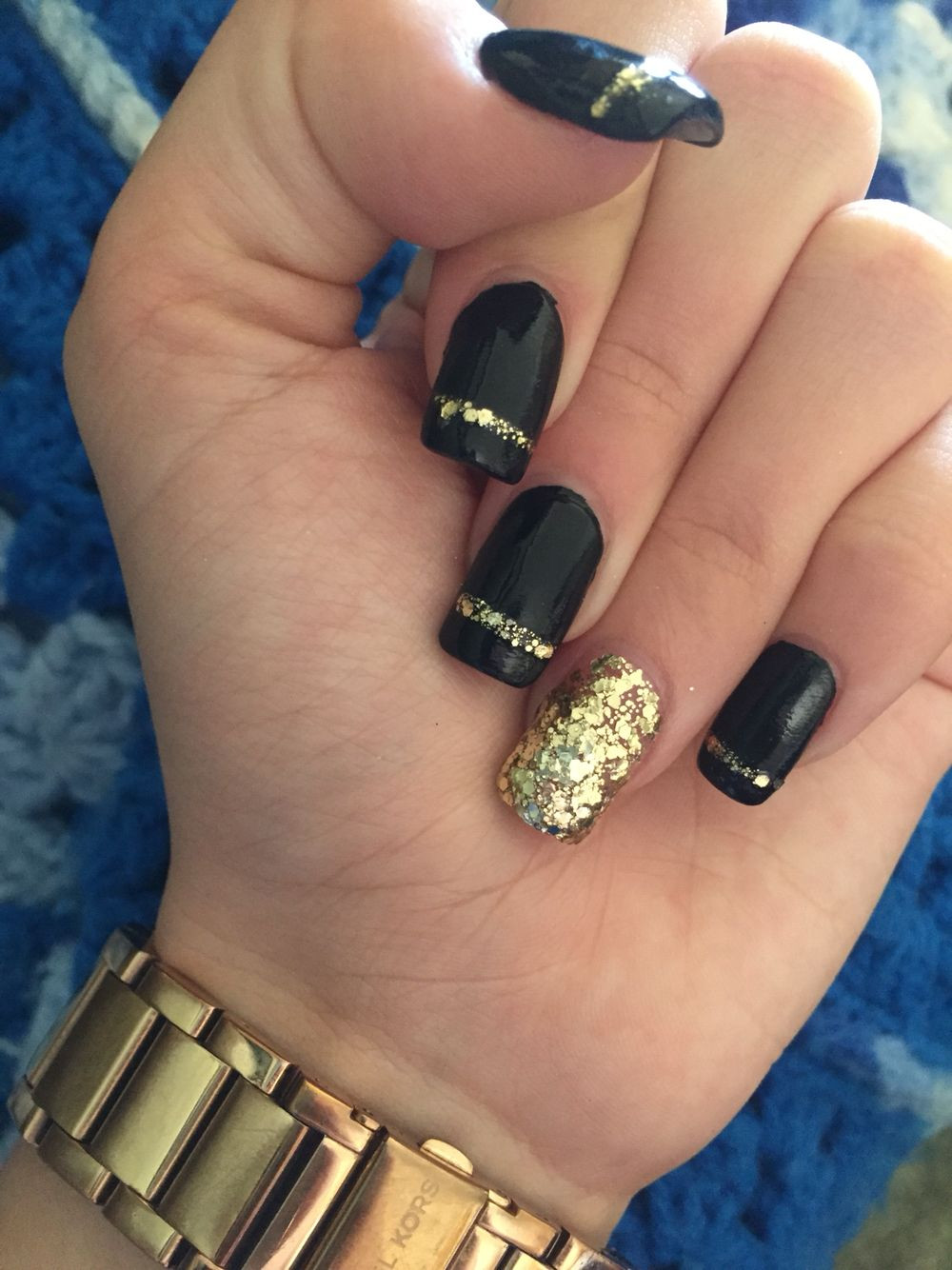 Black Gold Nail Designs
 Black and gold nails