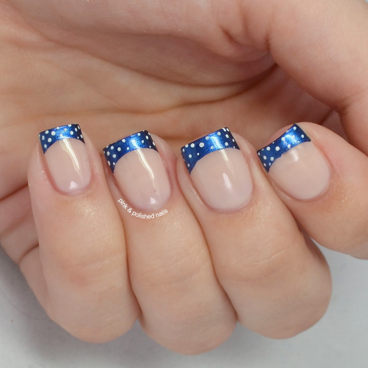 Blue French Tip Nail Designs
 Pink & Polished Navy french tips with white baby dots