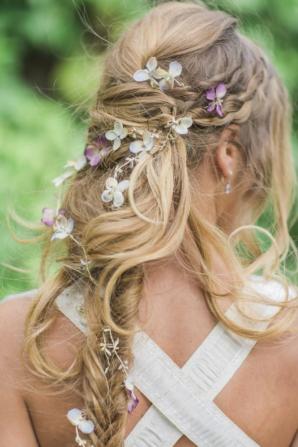 Bohemian Wedding Hairstyle
 messy boho long bridal hairstyle with hydrangea