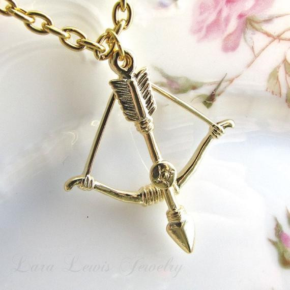 Bow And Arrow Necklace
 Diana Bow & Arrow Charm Necklace by ShopHedgerowRose on Etsy