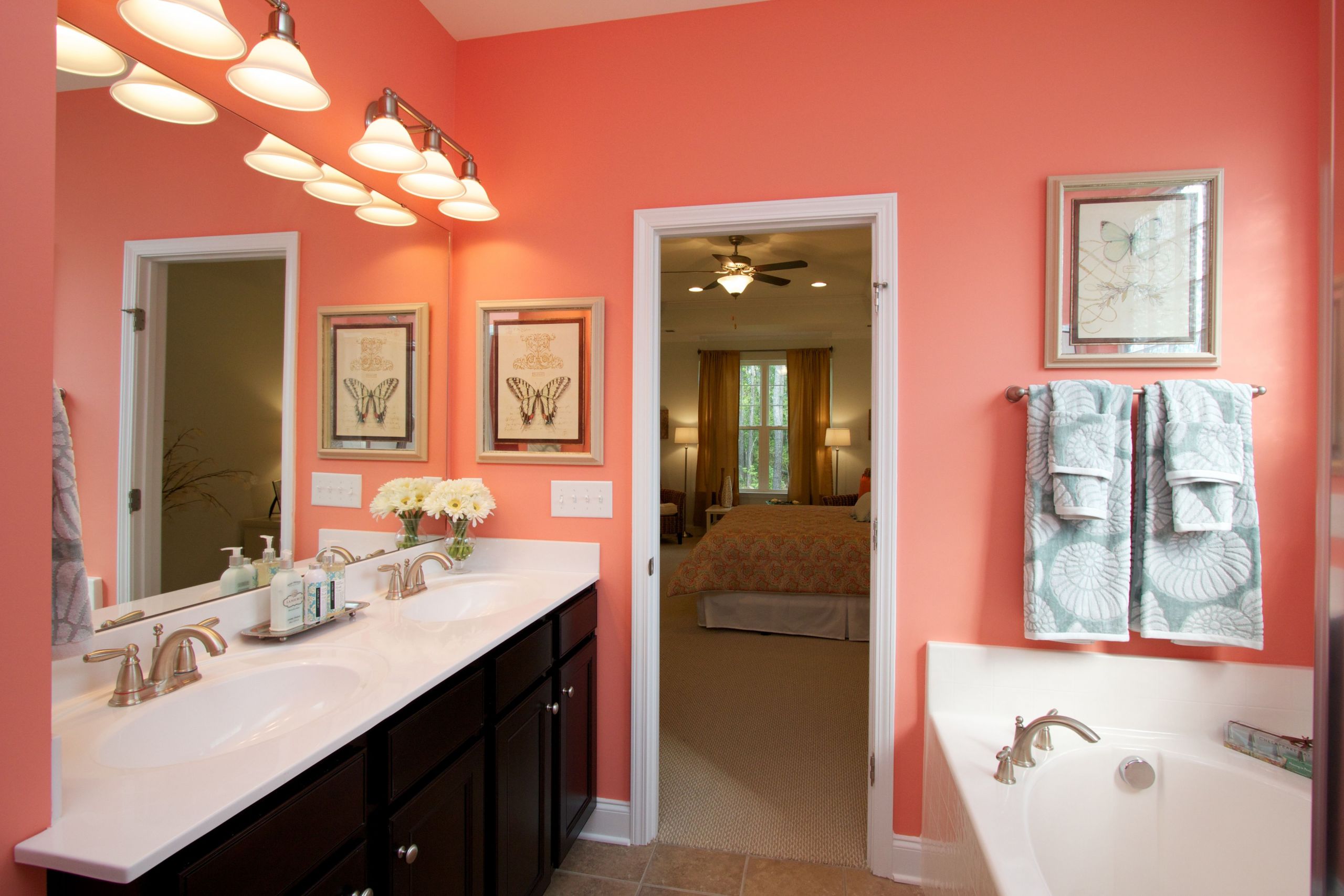 Bright Bathroom Colors
 love this bright coral colored bathroom would be cute with