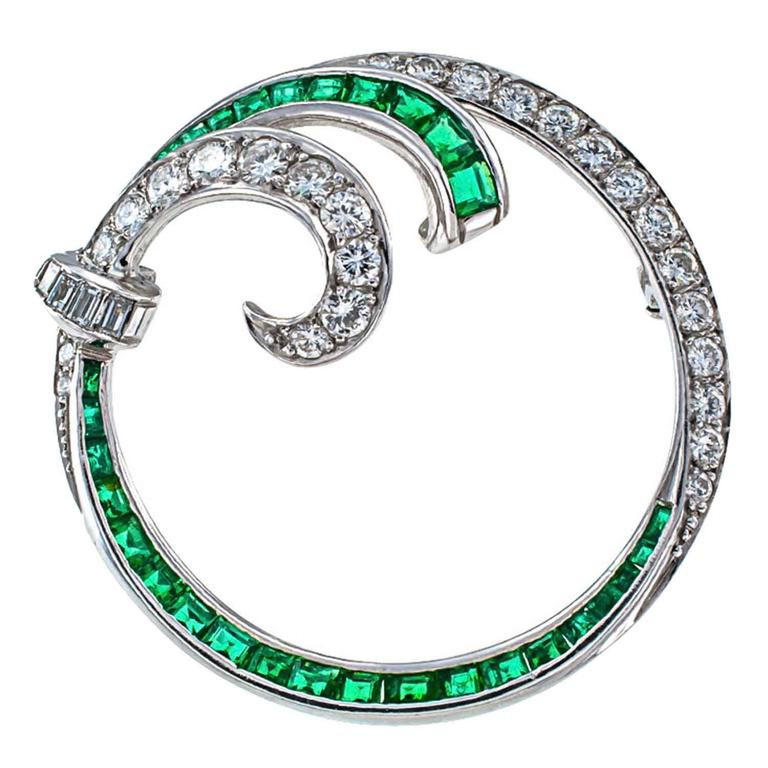 Brooches Circle
 1950 Emerald Diamond Platinum Circle Brooch For Sale at
