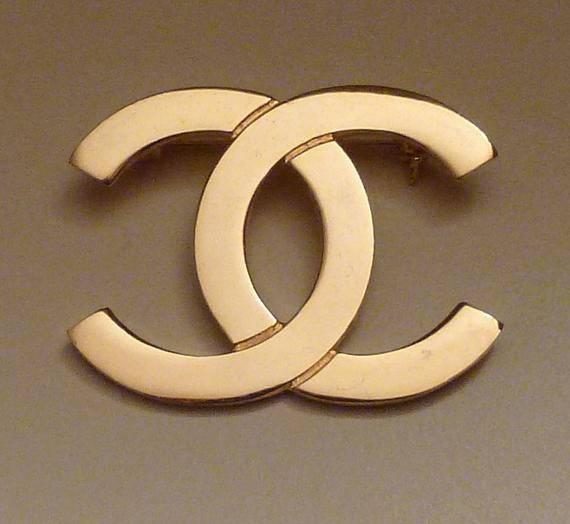 Brooches Logo
 Coco Chanel Logo CC Paris Interlocking C Gold Tone Metal Lapel