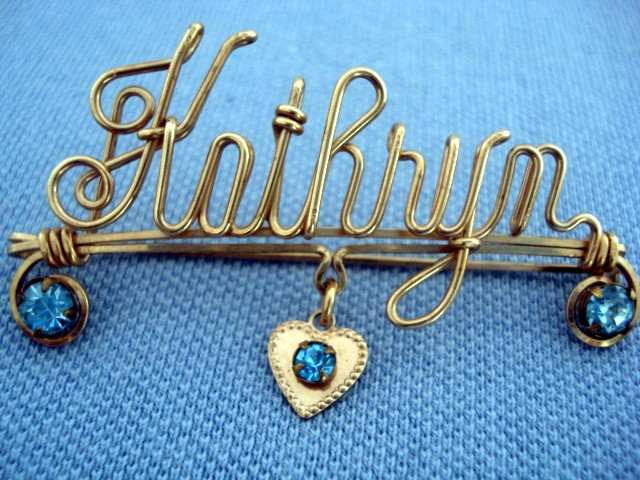Brooches Name
 1940 s Rolled Gold Wire Name Brooch Kathryn SOLD