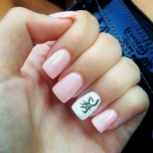 Browning Nail Designs
 I love the browning symbol on it but not digging the nails