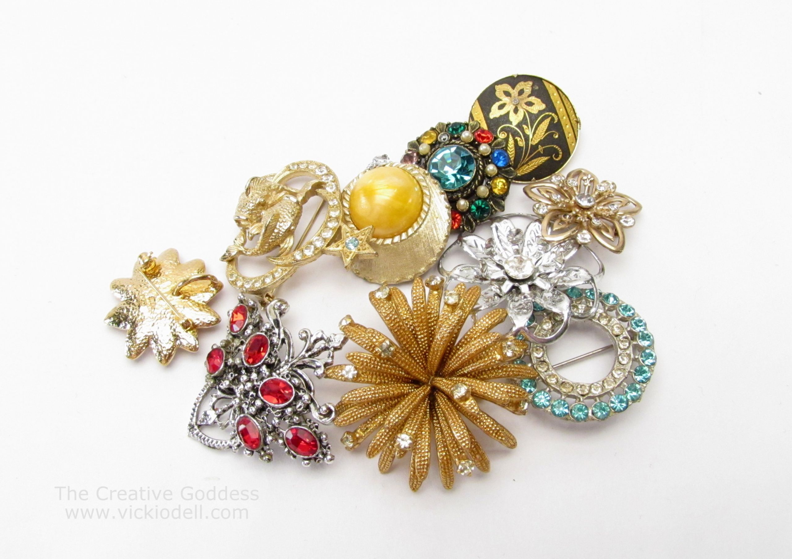 Button Brooches
 Make a New Brooch with Vintage Brooches Buttons and