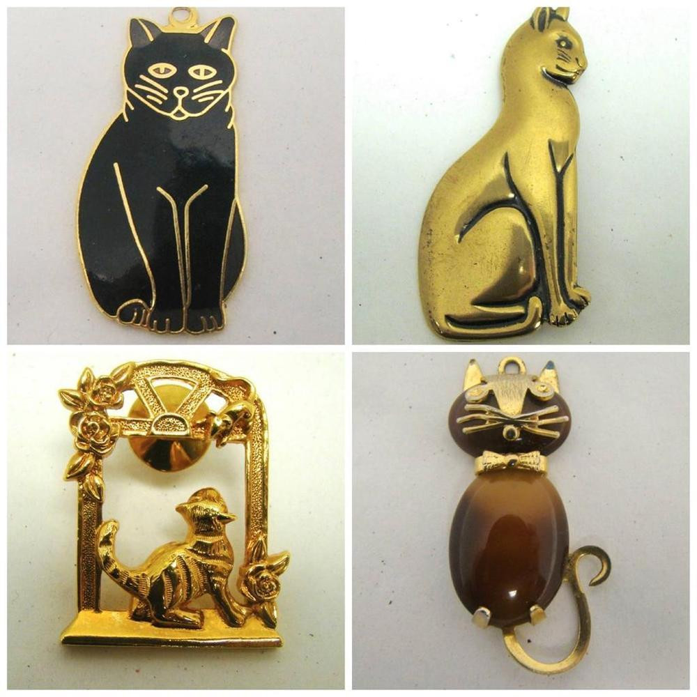 Cat Pins
 OBCO SIGNED 4 LOT GOLDTONE CAT PINS BROOCHES PENDANT