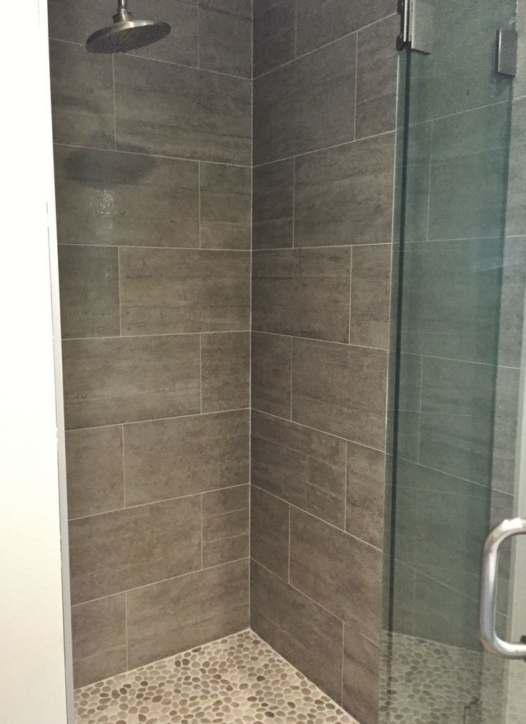 Ceramic Tile For Bathroom Showers
 Master Shower 12x24 porcelain tile on walls pebbles on