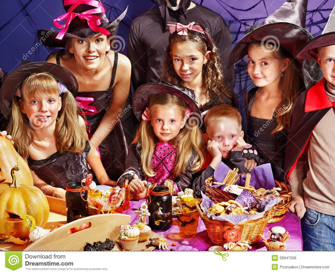 Child Halloween Party
 Children Halloween Party Making Pumpkin Stock