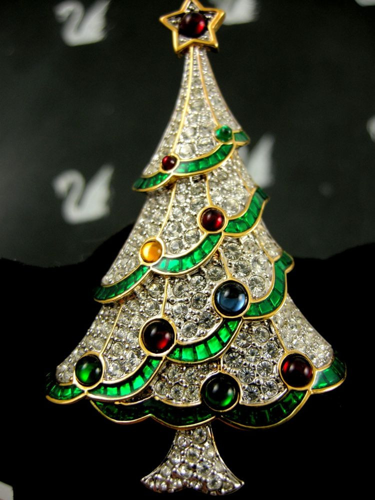 Christmas Brooches
 SIGNED SWAROVSKI PAVE CRYSTAL CHRISTMAS TREE PIN BROOCH
