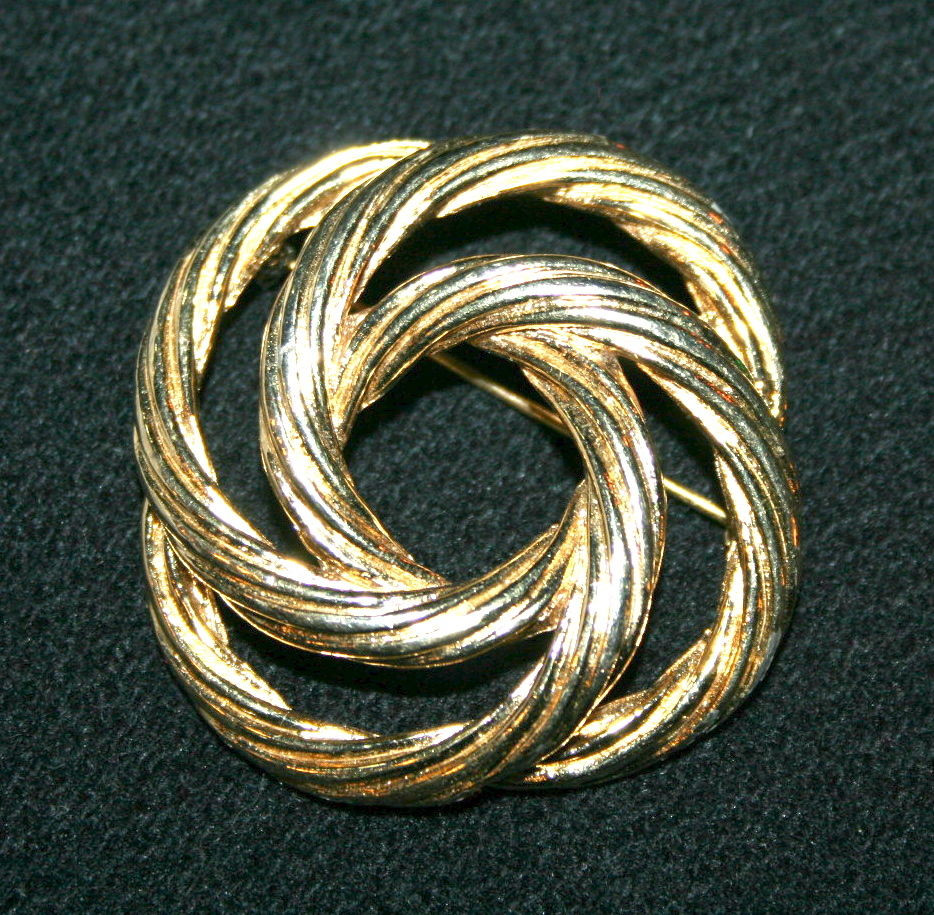 Circle Pins
 Vintage Monet circle gold tone pin brooch signed mid