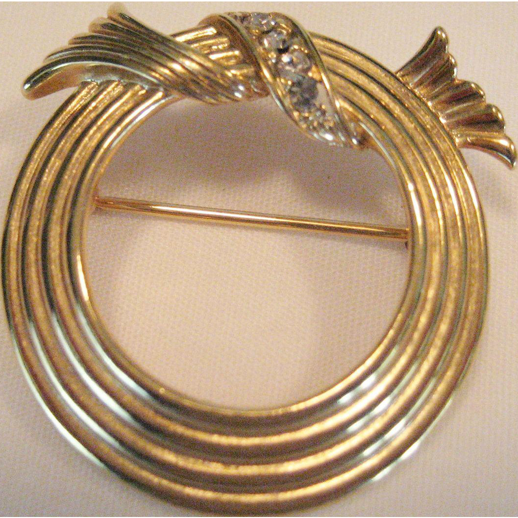 Circle Pins
 Avon Gold tone Circle Pin from thedaisychain on Ruby Lane