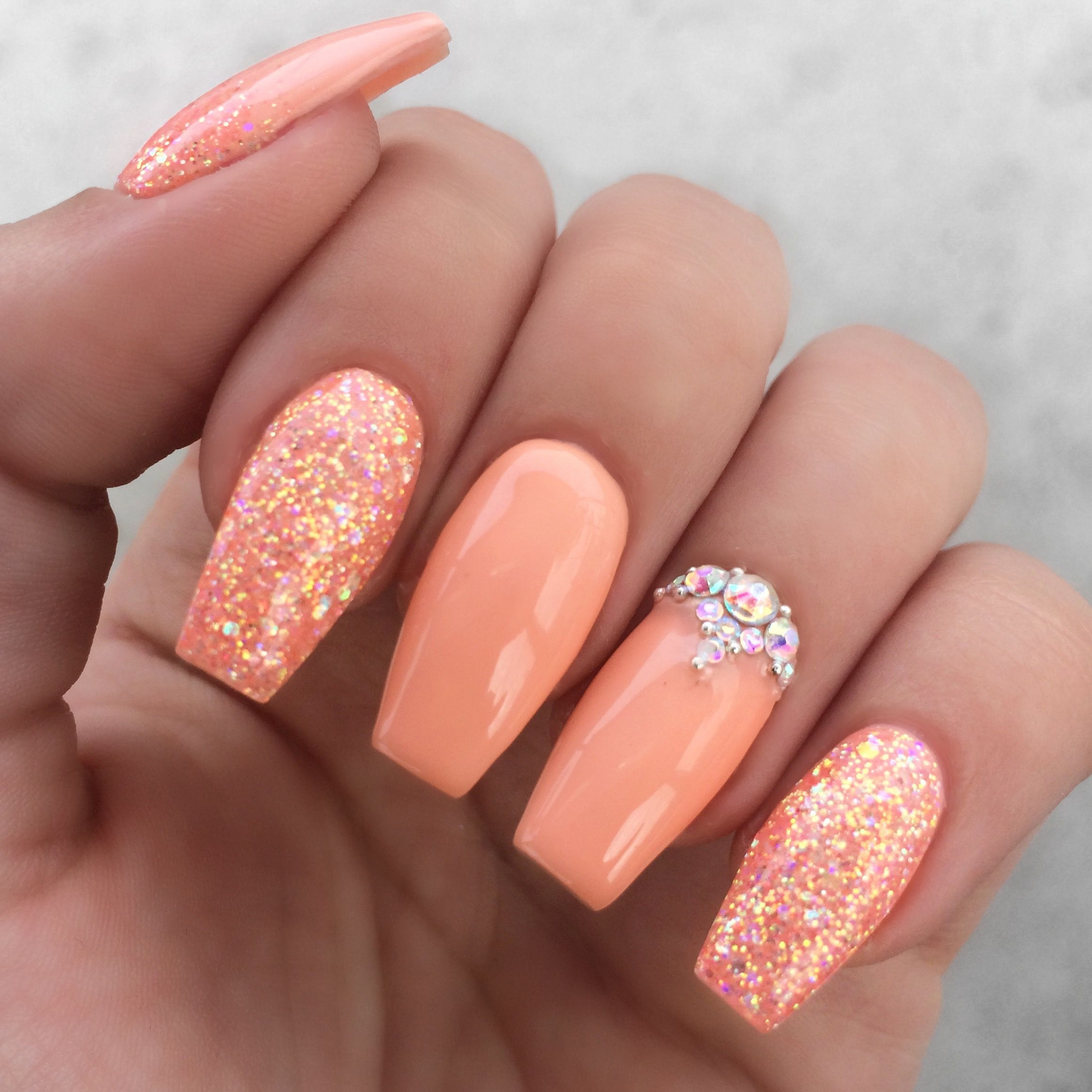 Coral Nail Ideas
 Girly peach glitter rhinestone nails