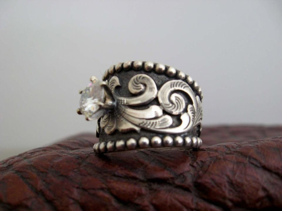 Cowgirl Wedding Rings
 Custom made western wedding rings by Travis Stringer