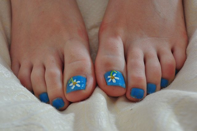 Daisy Toe Nail Art
 Nail Art My fiancee loves decorating her nails