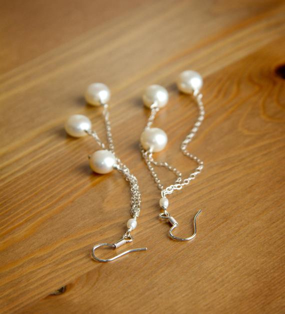 Dangling Pearl Earrings
 Long Dangling Pearl Earrings Pearls are Wire Wrapped