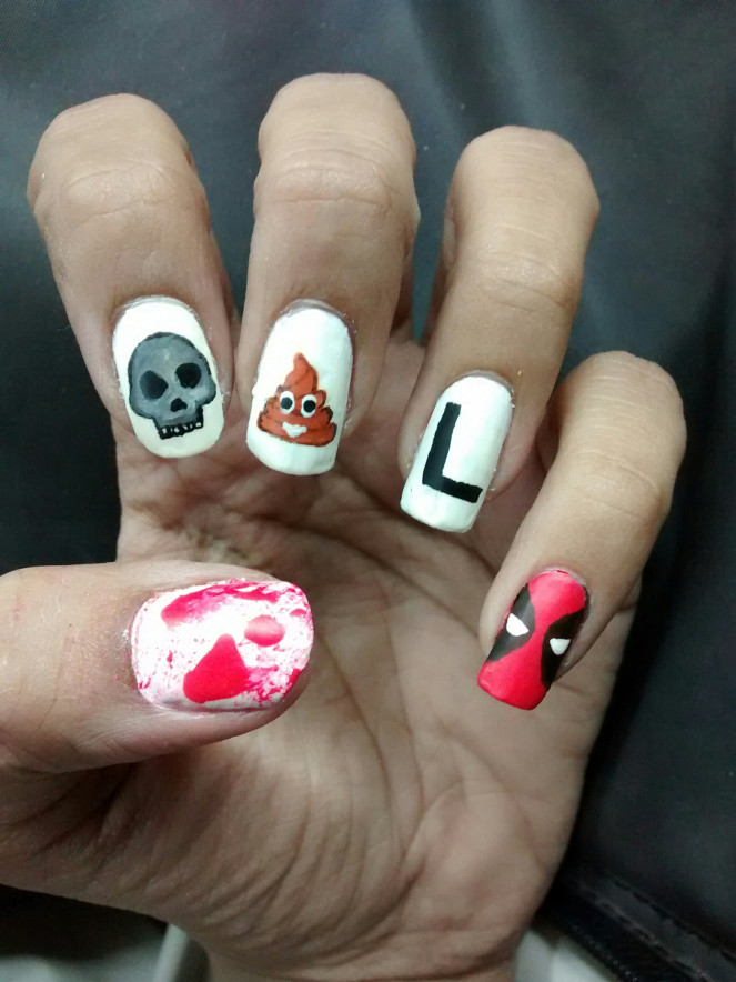 Deadpool Nail Art
 Deadpool nails – free hand – PowerPuffPolish