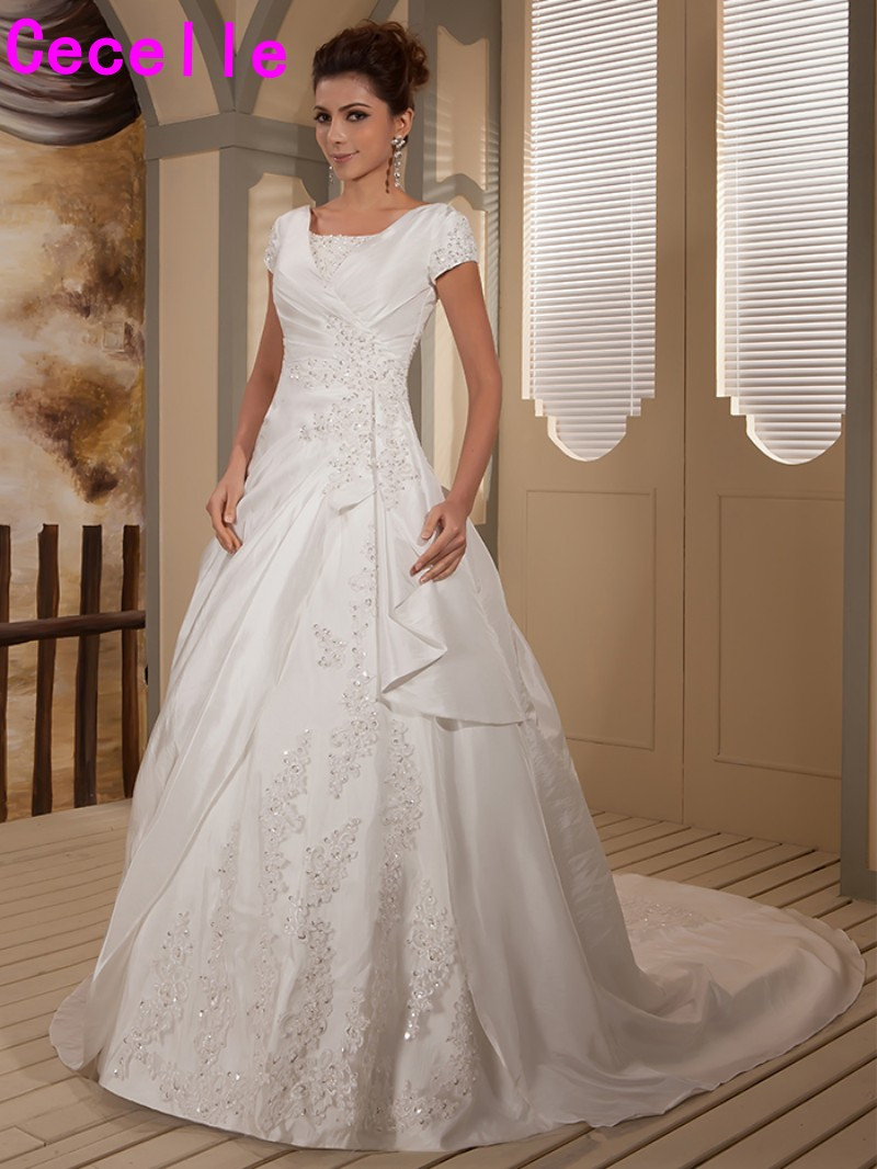 Designer Wedding Gown
 2017 Real Designer Modest Ball Gown Wedding Dresses Bridal