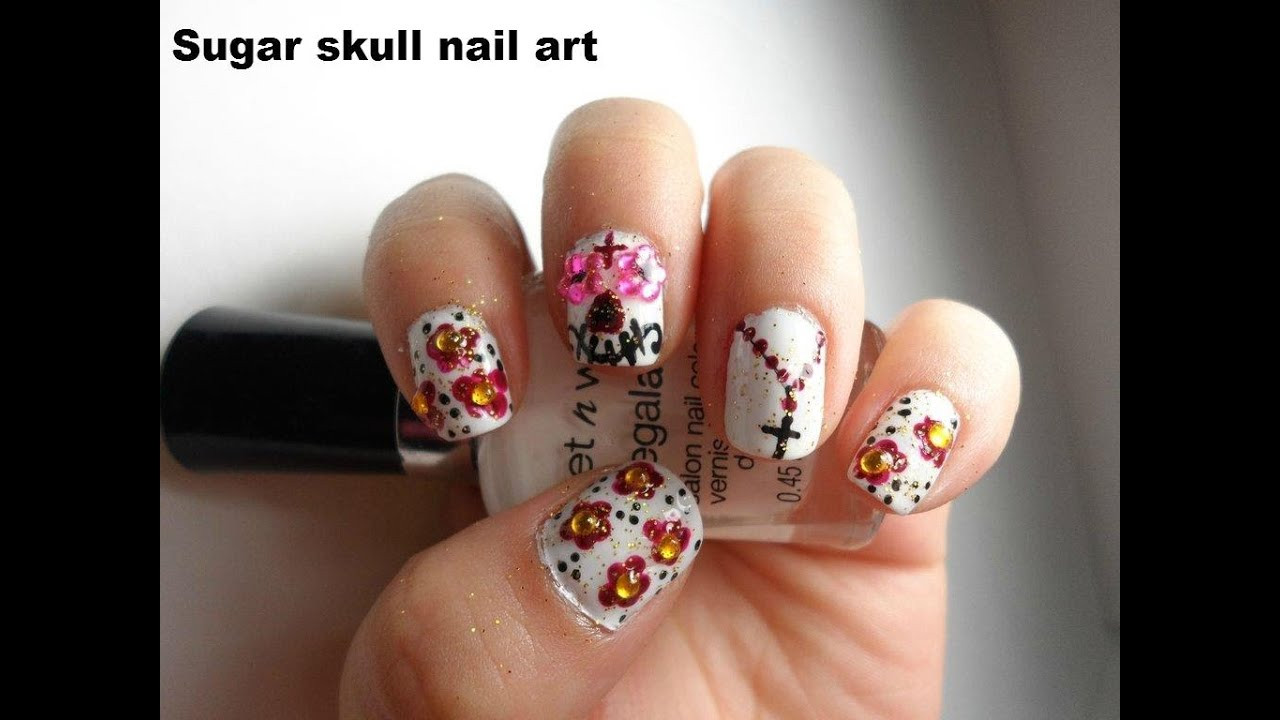 Dia De Los Muertos Nail Art
 Sugar skull Day of the Dead nail art El dia de Los