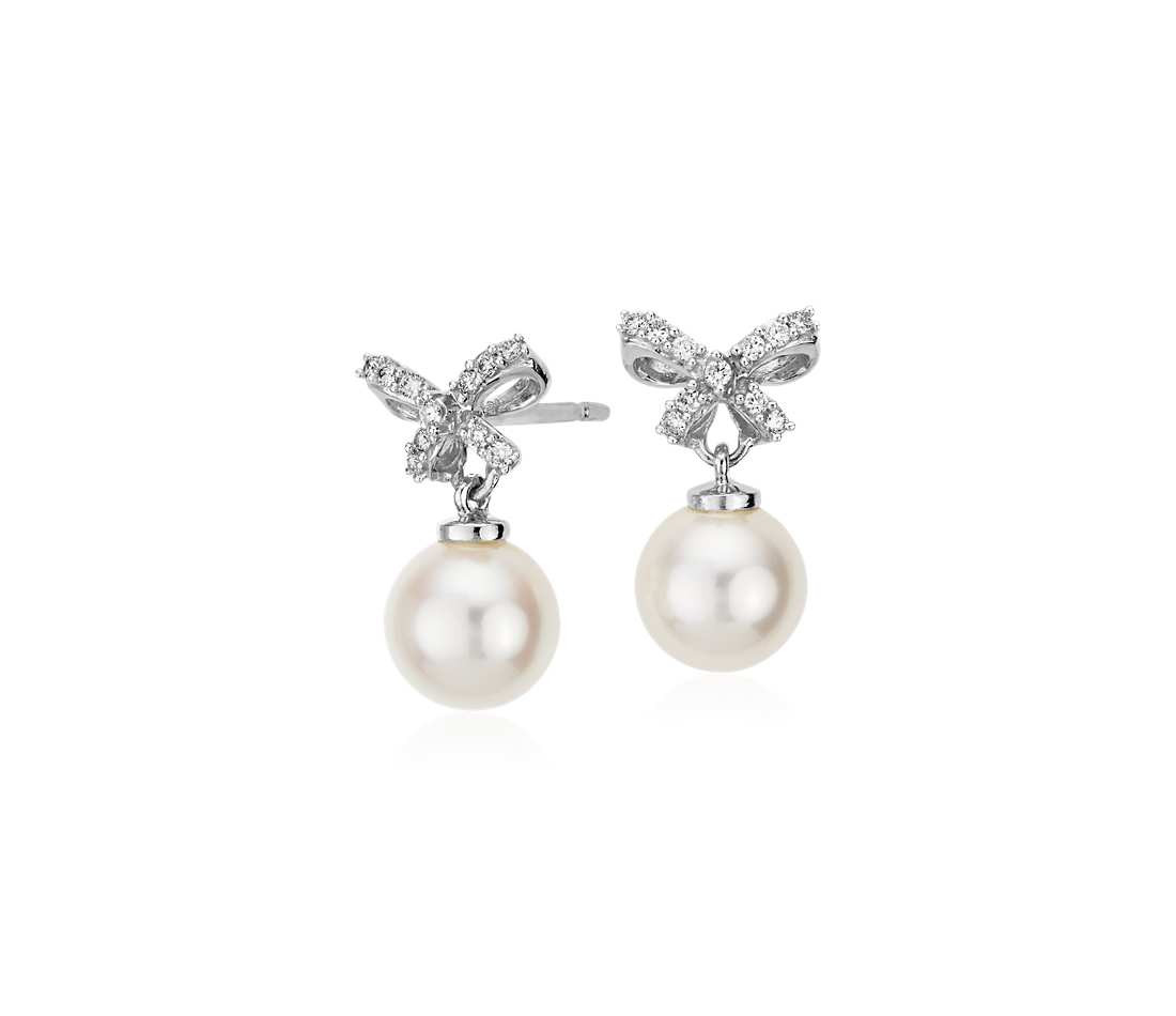 Diamond Bow Earrings
 Freshwater Cultured Pearl and Diamond Bow Earrings in 18k