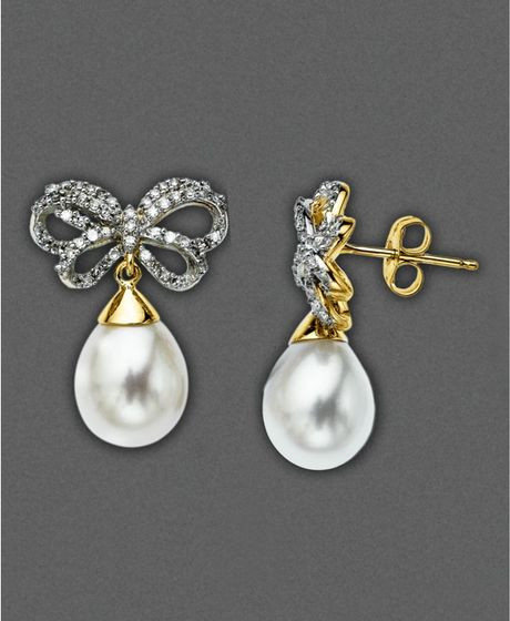 Diamond Bow Earrings
 Eci Cultured Freshwater Pearl and Diamond Bow Earrings in