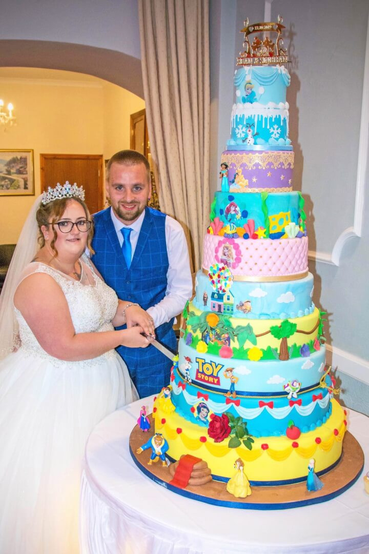 Disney Wedding Theme
 Couple ties the knot with 10 tiered Disney wedding cake